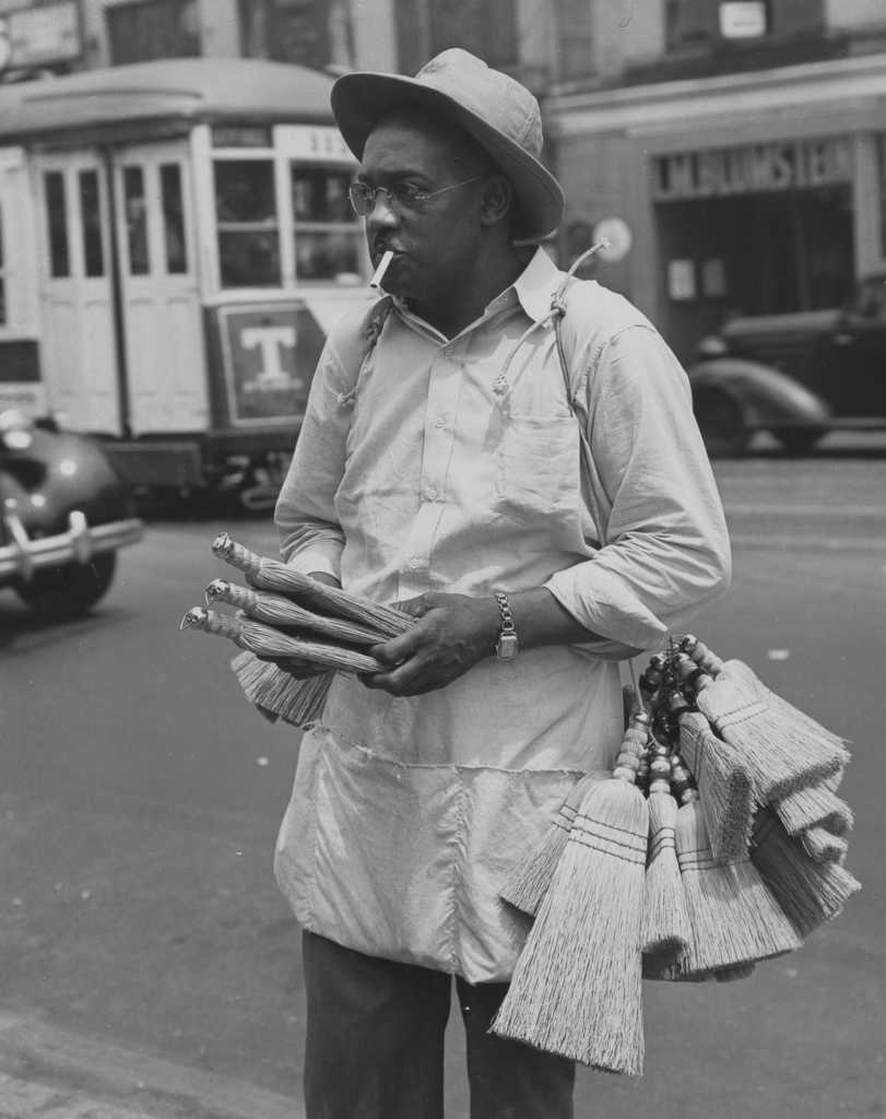 1946 125th Street Harlem. Whisk broom salesman.