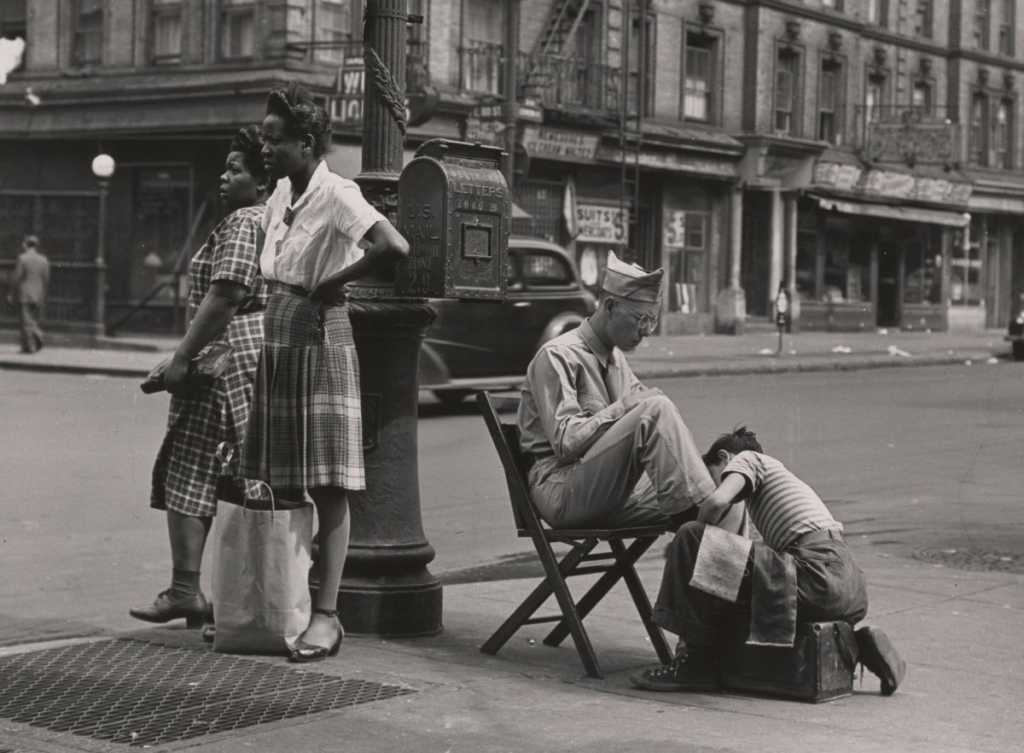 A soldier getting a shoe shine on 125th Street. 1946. 1200x882 1