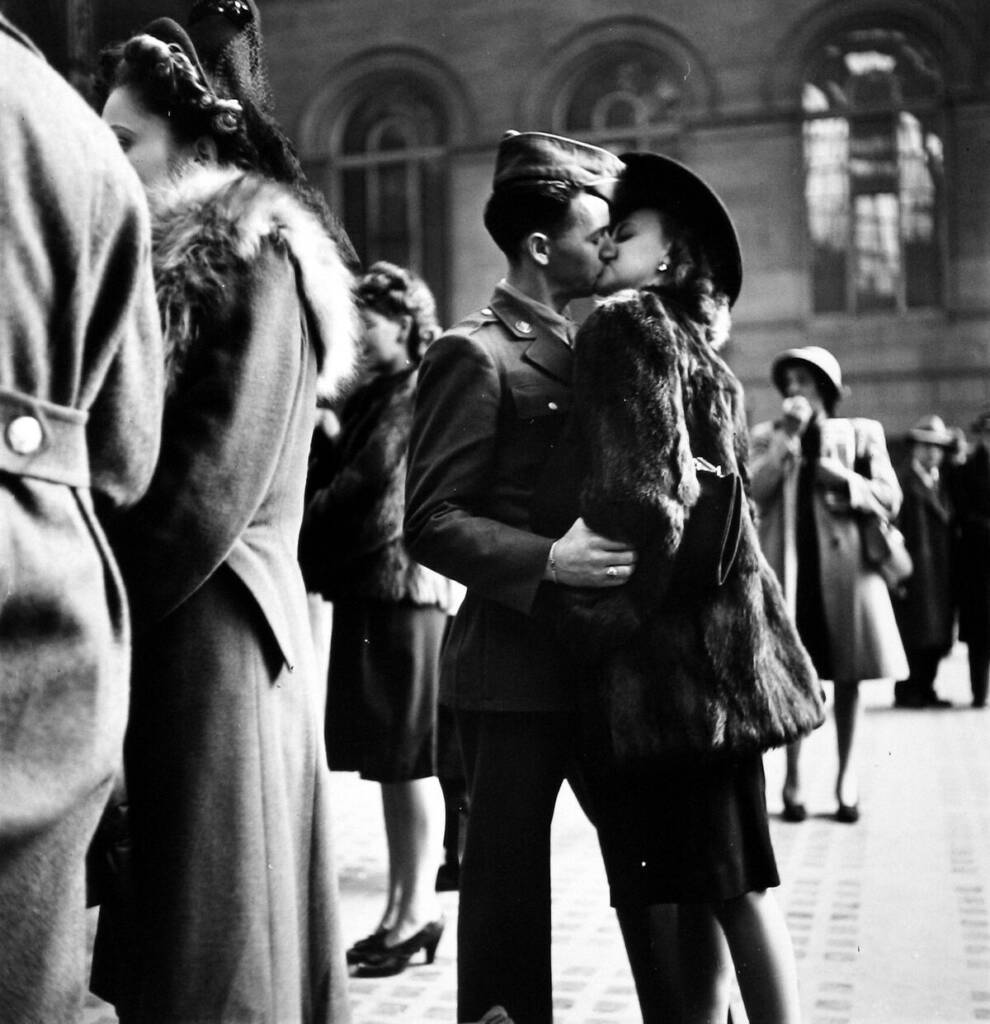 Couple in Penn Station sharing farewell kiss before he ships off to war during WWII NY 1943 © Alfred Eisenstadt