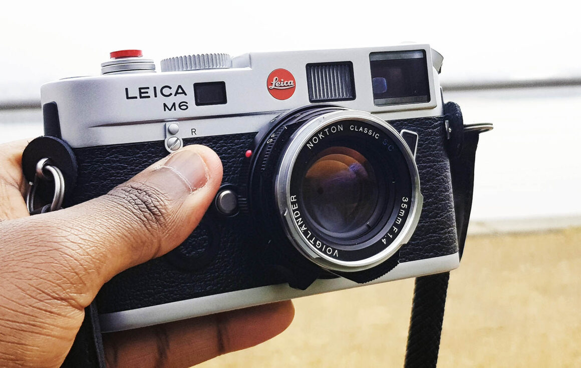 holding a leica m6