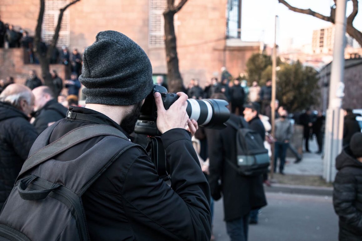 photojournalist at demonstration
