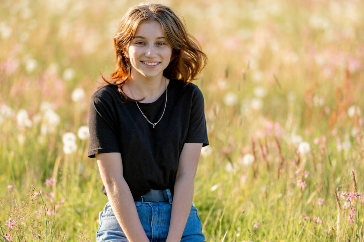 girl with a natural smile outdoors