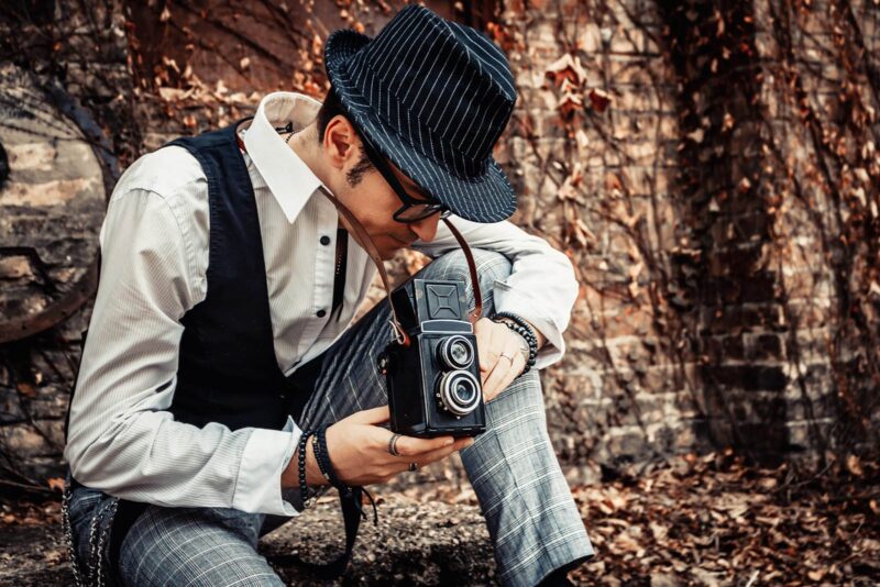 photographer with twin lens reflex camera