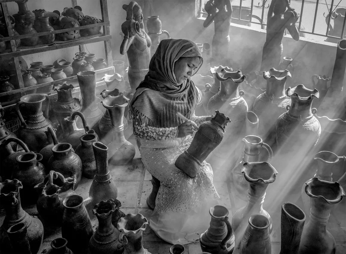Black and White Photo Awards 2024 6 Pottery village girl by Van Dong Nguyen Portrait Category Winner in the Black and White Photo Awards 2024