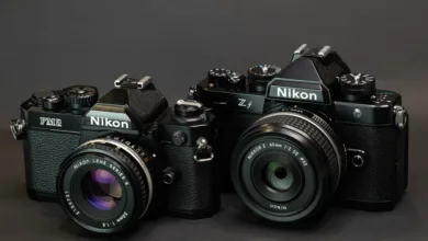 Nikon Z5II vs Nikon Zf 16 nikon zf sitting next to fm2
