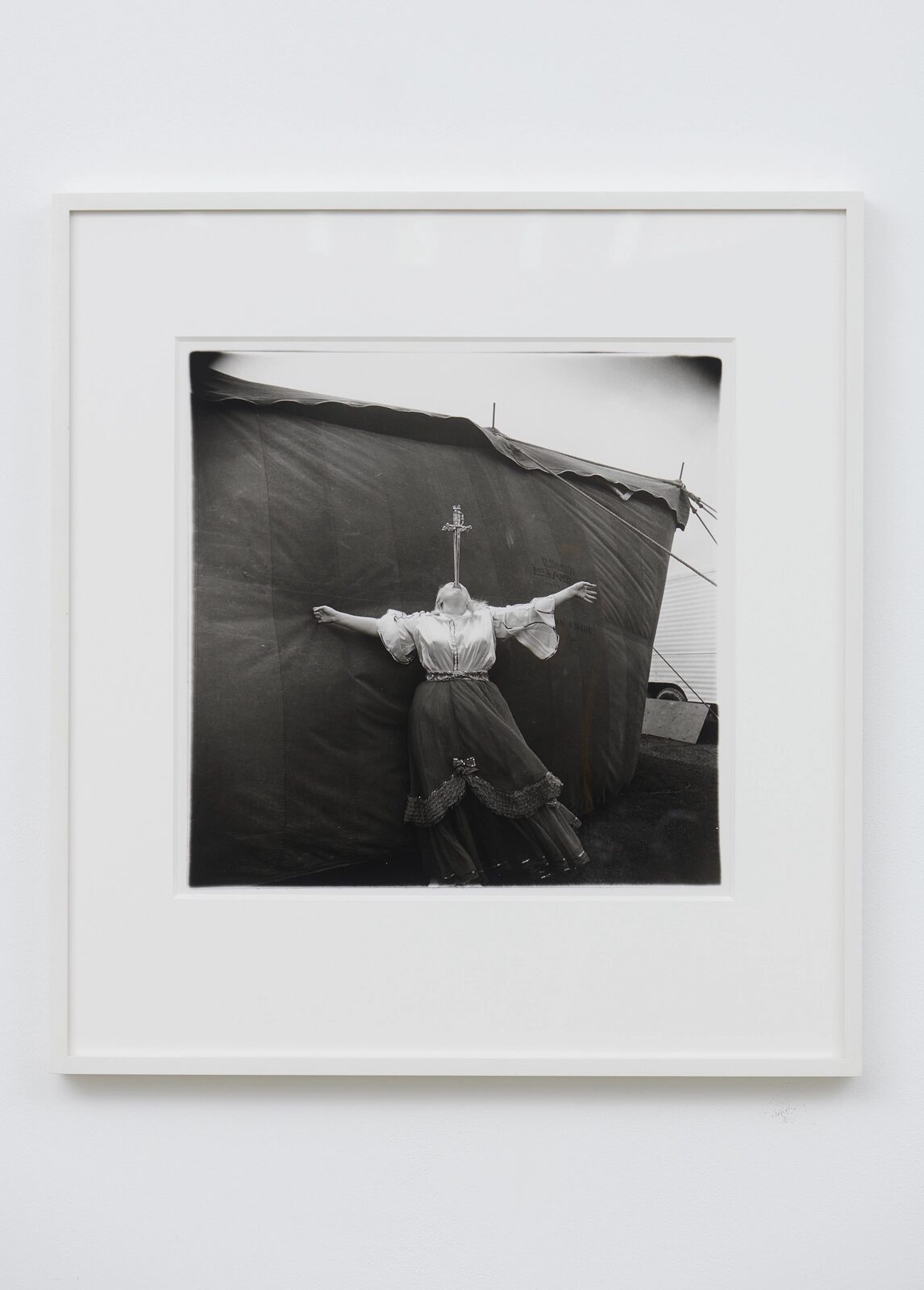 Albino Sword Swallower at a Carnival