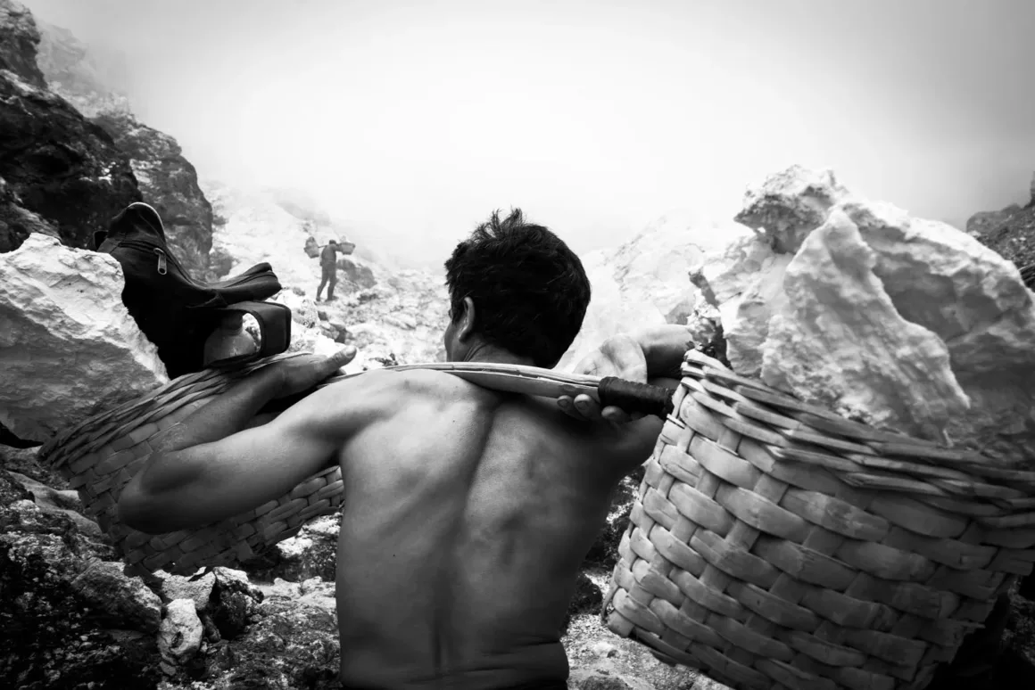 Sebastiao Salgado – Workers carrying sulphur Kawah Ijen Indonesia