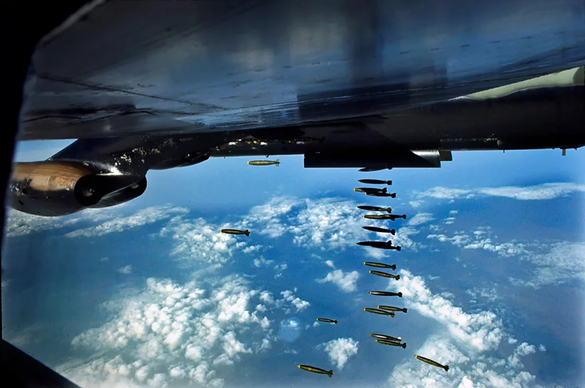 B 52 bomber dropping 500 pound bombs on enemy troops at the border of NorthVietnam 1968 C The LIFE Picture Collection Image by Co Rentmeester