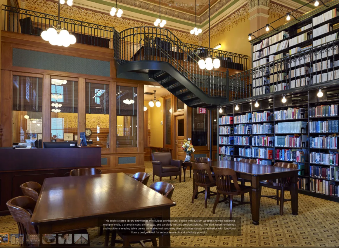 HiRezGo: Fotoğrafları Sıkıştırmadan Paylaşmanın Yeni Yolu 11 A spacious, elegant library room with tall bookshelves, wooden tables and chairs, a decorative staircase, ornate ceiling, and large pendant lights, creating a warm, inviting atmosphere for reading and study.