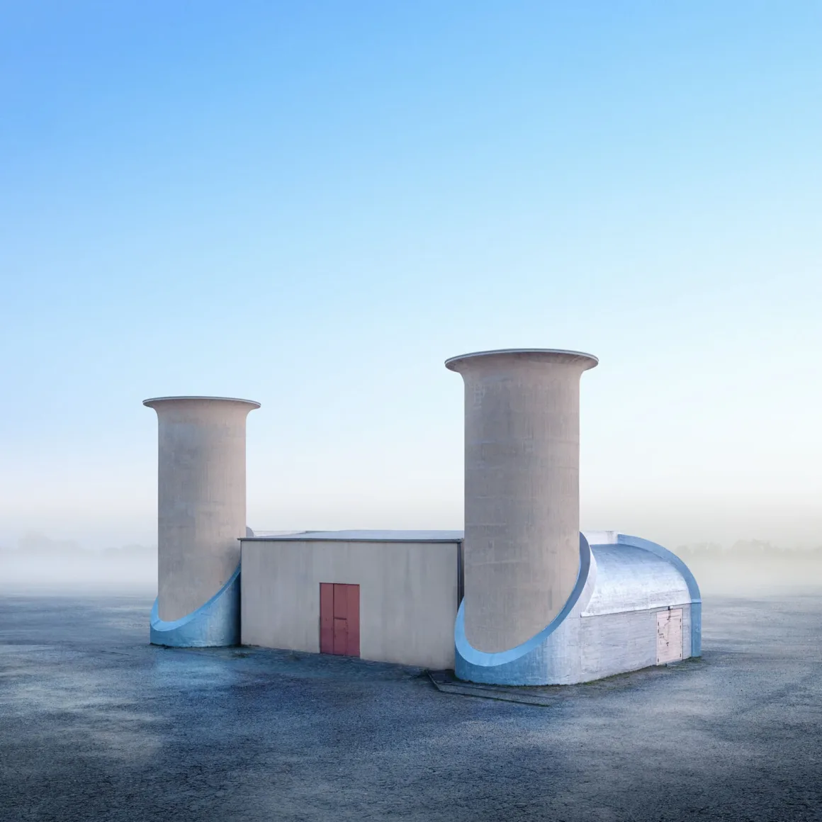 Minimalist Fotoğraf Ödülleri 2026: Kazananlar Sadeliğin Gücünü Gösteriyor 51 A minimalist industrial structure with two large, cylindrical concrete towers stands on a flat, foggy, grey surface.