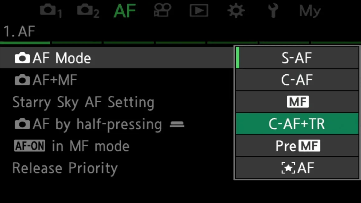 OM System PEN İncelemesi: Tanıdık Ama Son Derece Şık 30 A digital camera menu screen displays the AF (autofocus) settings, with the C-AF+TR option highlighted in a green box within a vertical list.
