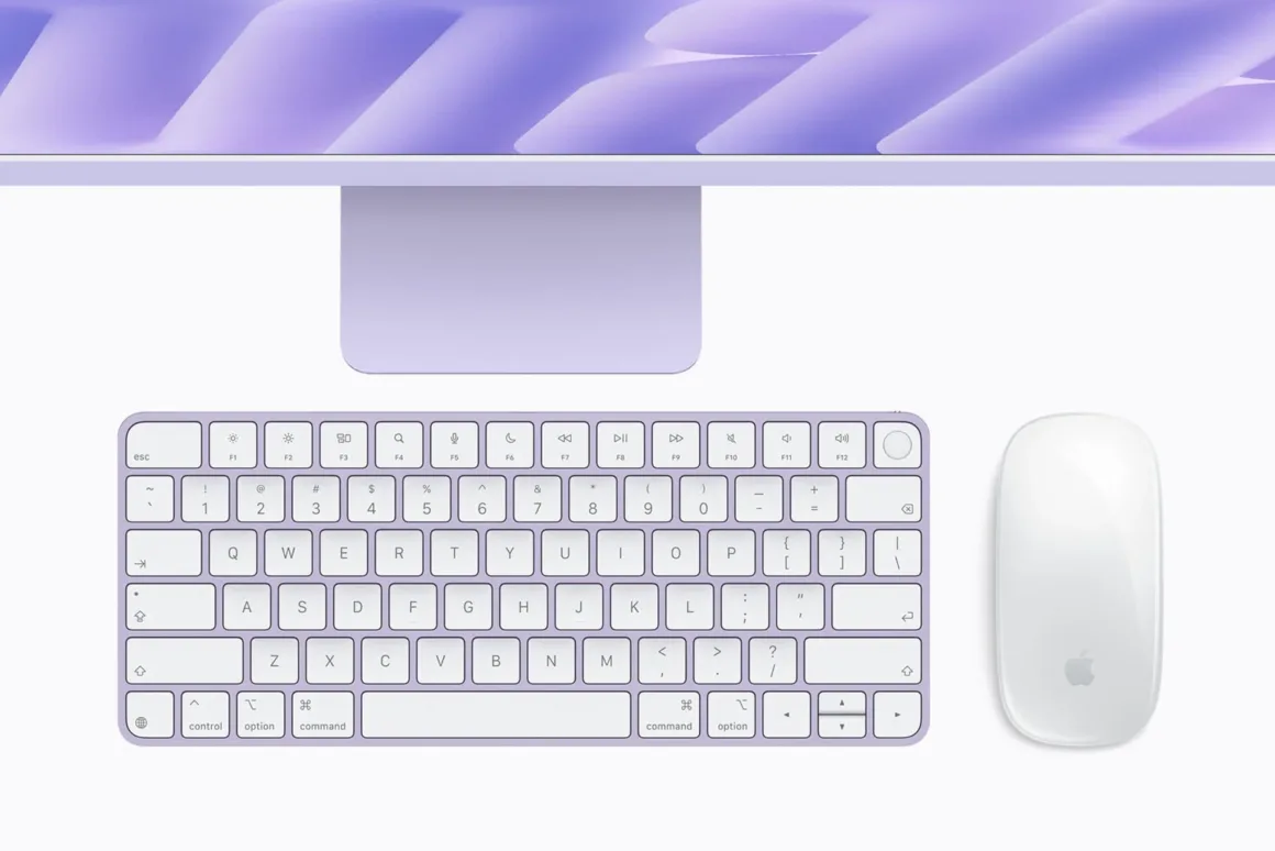 M6 iMac Tanıtıldı: Daha Güçlü Performans, Wi-Fi 7 ve 7 Renk Seçeneği 25 Mor renkli iMac, aynı renkle uyumlu kablosuz klavye ve beyaz Magic Mouse ile beyaz yüzey üzerinde duruyor.