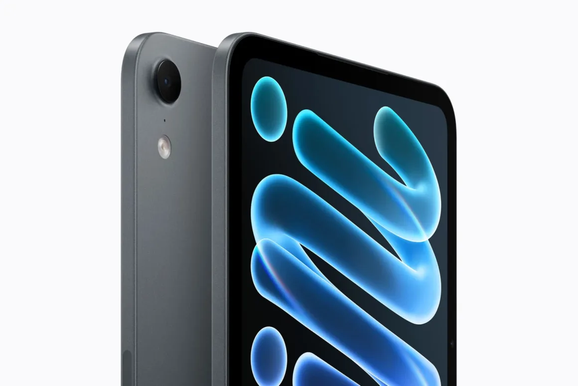 Yeni iPad mini Tanıtıldı: OLED Ekran, A20 Pro ve Daha İnce Tasarım 22 Koyu gri tabletin arka kamera lensi, flaşı ve ekranındaki mavi soyut grafiğin bir bölümü yakın planda görülüyor.